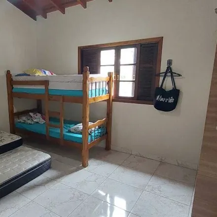 Rent this 4 bed house on Caraguatatuba