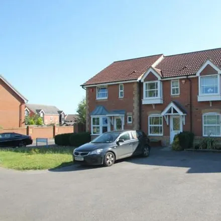 Rent this 2 bed townhouse on Baird Road in Arborfield Green, RG2 9QN