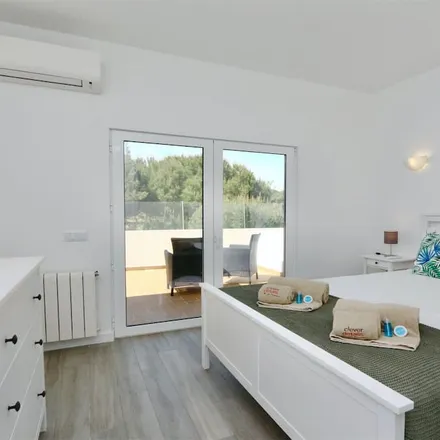 Rent this 4 bed house on 8125-441 Distrito de Évora
