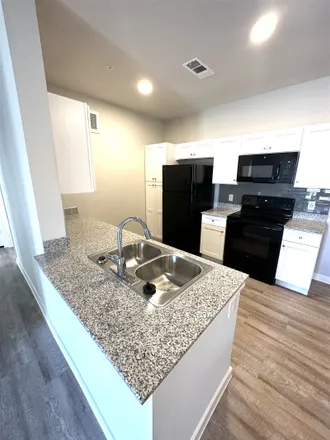 Rent this 1 bed condo on 12605 Vantage Parkway
