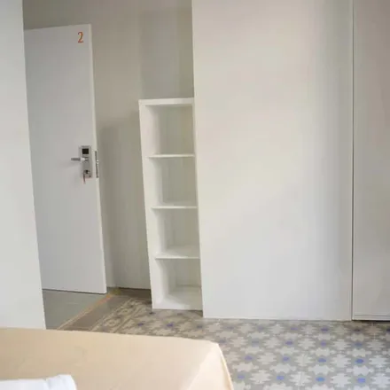 Rent this 4 bed room on Royal Square in Passatge de Bacardí, 08001 Barcelona