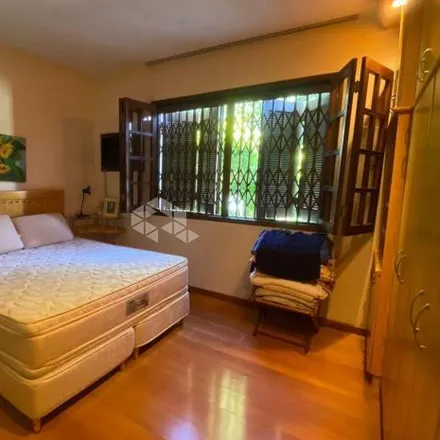 Buy this 3 bed house on Rua Waldemar Vicentini in Jardim Guaianuba, Gravataí - RS