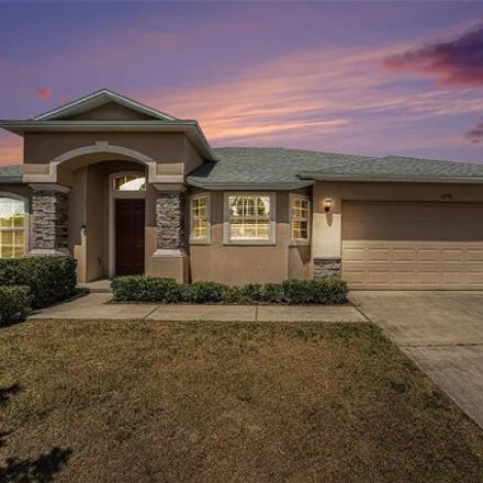 Buy this 4 bed house on 5799 Woodruff Way in Polk County, FL 33812