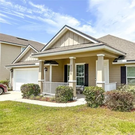 Rent this 3 bed house on 8258 NW 54th St in Gainesville, Florida