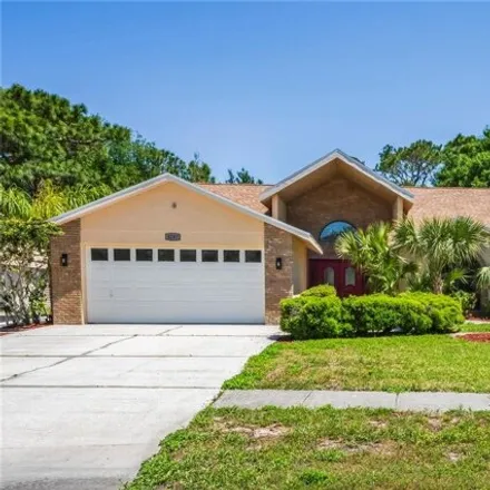 Buy this 3 bed house on 4271 Surfside Circle in Spring Hill, FL 34606