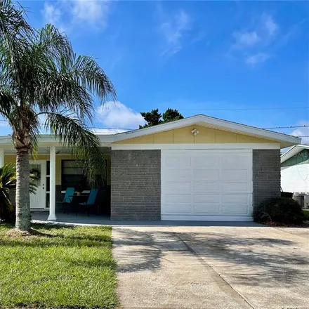Buy this 4 bed house on 5250 Dawn Lane in Holiday, FL 34690