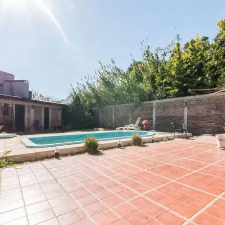 Buy this 4 bed house on San Basilio in Partido de Lomas de Zamora, B1834 FYG Turdera