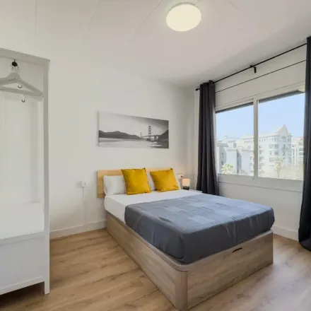 Rent this 9 bed apartment on TESLA in Carrer del Rosselló, 08008 Barcelona