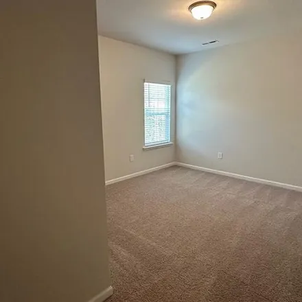 Rent this 4 bed apartment on 5111 Tyndall Drive in Country Lane Estates, Lee County