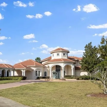 Buy this 6 bed house on 3024 Porto Lago Court in Orange County, FL 34786