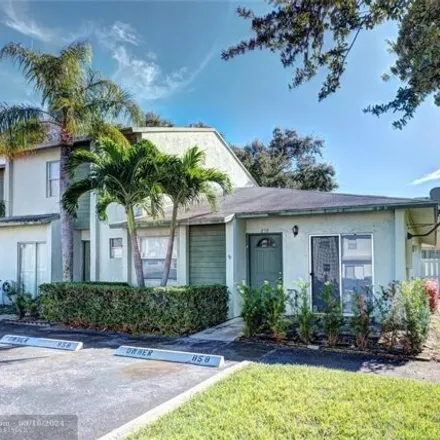 Rent this 2 bed house on 858 Crystal Lake Dr in Deerfield Beach, Florida