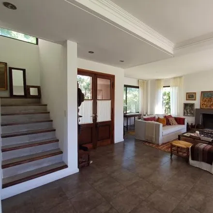 Rent this 4 bed house on Saravi in La Lonja, B1631 BUI Buenos Aires