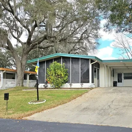 Buy this studio apartment on 5909 Heritage Drive in Groveland, FL 34736