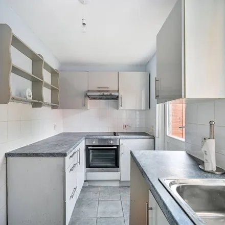 Rent this 2 bed townhouse on Heathlands Court in London, TW4 5BS