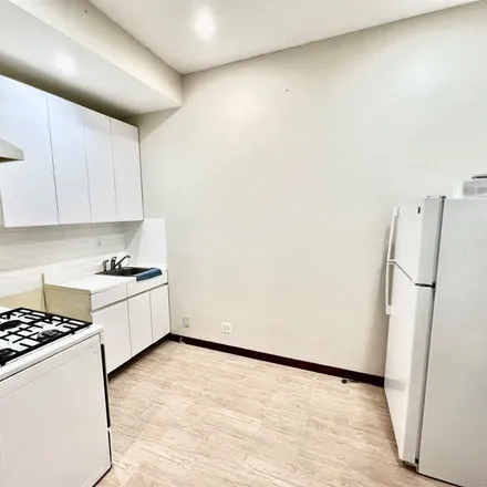 Rent this 2 bed apartment on 38-33 Woodside Avenue in New York, NY 11377