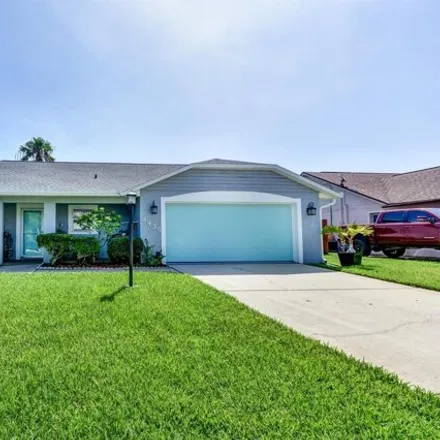 Rent this 3 bed house on 4439 Katy Drive in New Smyrna Beach, FL 32169