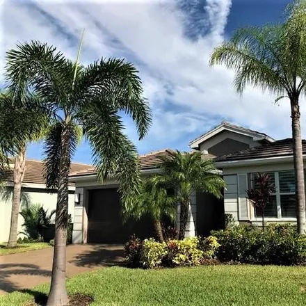 Buy this 2 bed house on Palm Cove Golf & Yacht Club in 2363 Southwest Carriage Hill Terrace, Palm City
