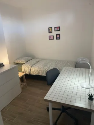 Rent this 8 bed room on Rua Carvalho Araújo 1 in 1885-020 Loures, Portugal