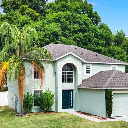 Buy this 4 bed house on 1073 Osprey Cove Circle in Groveland, FL 34736