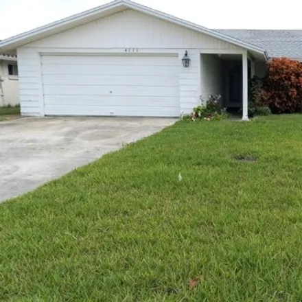 Buy this 3 bed house on 4077 Topsail Trail in Gulf Harbors, Elfers
