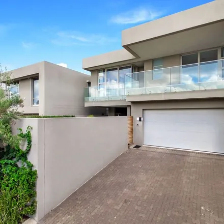 Rent this 4 bed townhouse on Loudoun Road in Benmore Gardens, Sandton
