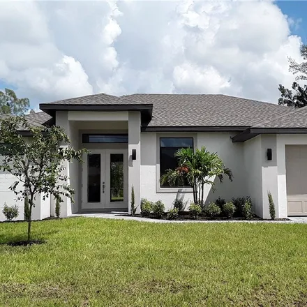 Buy this 4 bed house on 4105 33rd Street Southwest in Lehigh Acres, FL 33976
