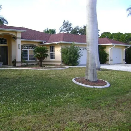 Buy this 3 bed house on 2042 Southeast 8th Avenue in Cape Coral, FL 33990