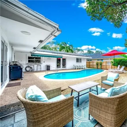Buy this 4 bed house on 6475 Northeast 22nd Avenue in Imperial Point, Fort Lauderdale