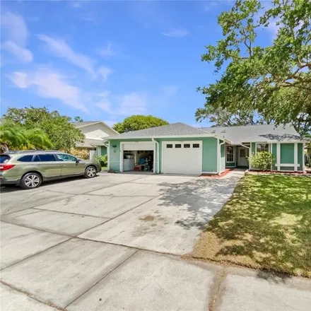 Buy this 3 bed house on 7931 Merrimac Cove Drive in Orange County, FL 32822