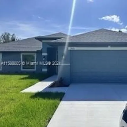 Rent this 4 bed house on 1974 Loyola Avenue in Lehigh Acres, FL 33972