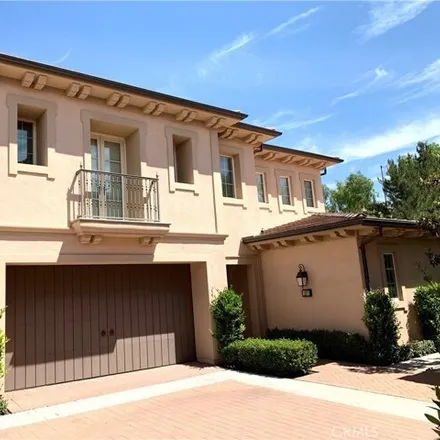 Rent this 4 bed condo on 107 Mustang in Irvine, CA 92602