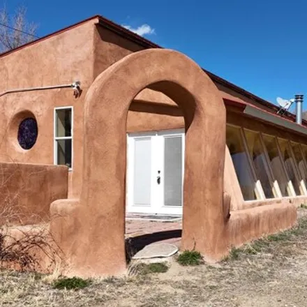 Buy this 4 bed house on 132 Embargo Road in Questa, Taos County