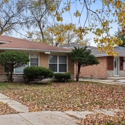 Rent this 3 bed house on 14437 Sanderson Ave in Dolton, Illinois