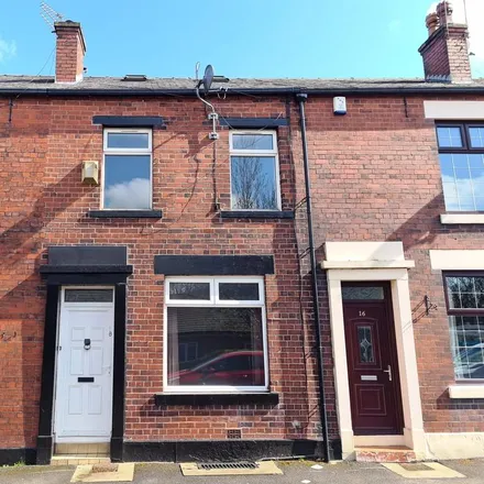 Rent this 3 bed townhouse on Rowlands Pharmacy in Stonefield Street, Milnrow