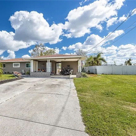Buy this 2 bed house on 1406 Northeast 5th Lane in Cape Coral, FL 33909