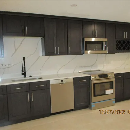 Rent this 4 bed apartment on 3598 Atlanta Street in Hollywood, FL 33021
