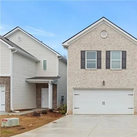 Rent this 4 bed house on 964 Valley Rock Drive in Redan, GA 30058