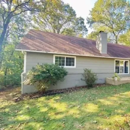 Rent this 3 bed house on 26 Lancaster Drive in Bella Vista, AR 72715