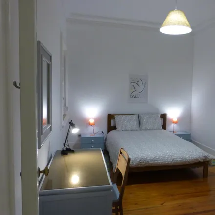 Rent this 6 bed room on Avenida Praia da Vitória 77 in 1050-120 Lisbon, Portugal