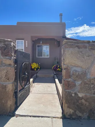 Buy this 4 bed house on 6340 Jaguar Drive in Santa Fe, NM 87507