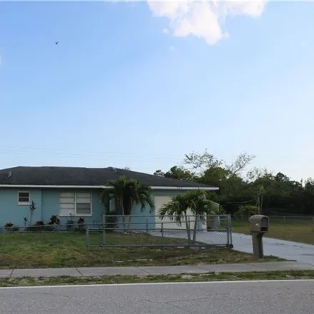 Rent this 3 bed house on 441 Arthur Avenue in Lehigh Acres, FL 33936
