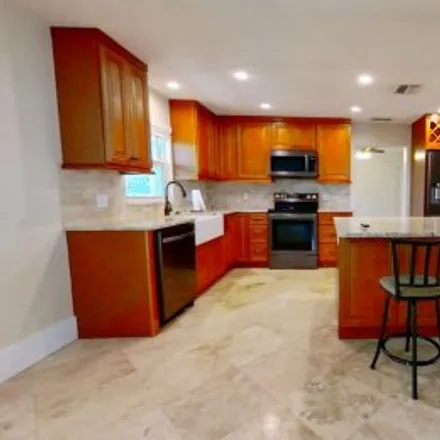 Rent this 4 bed apartment on 698 107Th Avenue North in North Naples, Naples