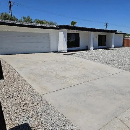 Buy this 4 bed house on 1856 East Joyce Drive in Palm Springs, CA 92262