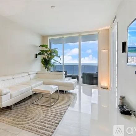 Rent this 2 bed condo on 18201 Collins Ave