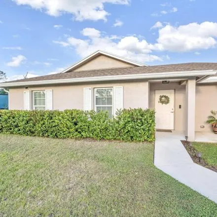 Buy this 3 bed house on 3290 Southeast Quay Street in Port Saint Lucie, FL 34984