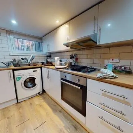 Rent this 4 bed townhouse on Royal Park Avenue in Leeds, LS6 1EZ