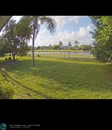 Rent this 3 bed house on 361 Northwest 201st Street in Andover Golf Estates, Miami Gardens