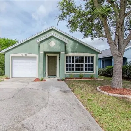 Buy this 3 bed house on 13161 Carrollwood Creek Drive in Hillsborough County, FL 33624