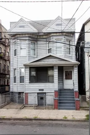 Buy this 7 bed house on 45 W 18th St in Bayonne, New Jersey