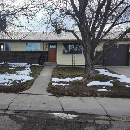 Buy this 2 bed house on 686 Barbara Court in Montrose, CO 81401